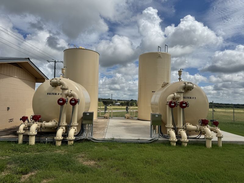 Water treatment facility with filter vessels controlled by WETS AI panels