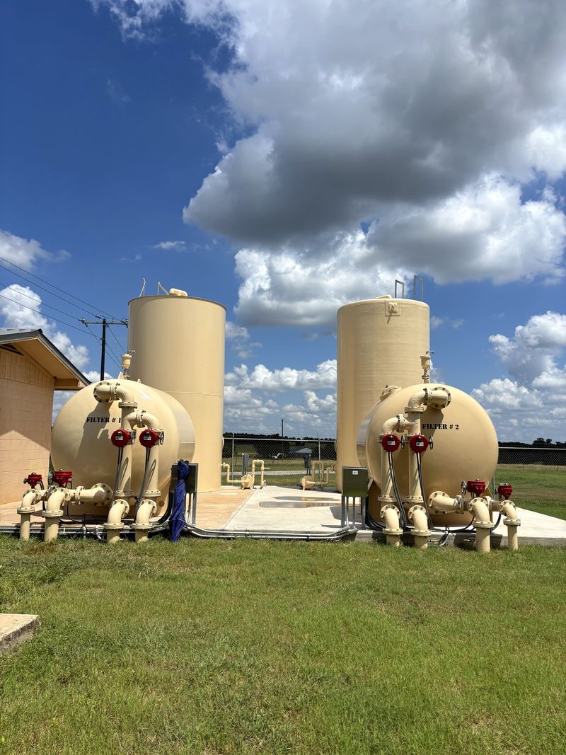 Water treatment facility with filter vessels controlled by WETS AI panels