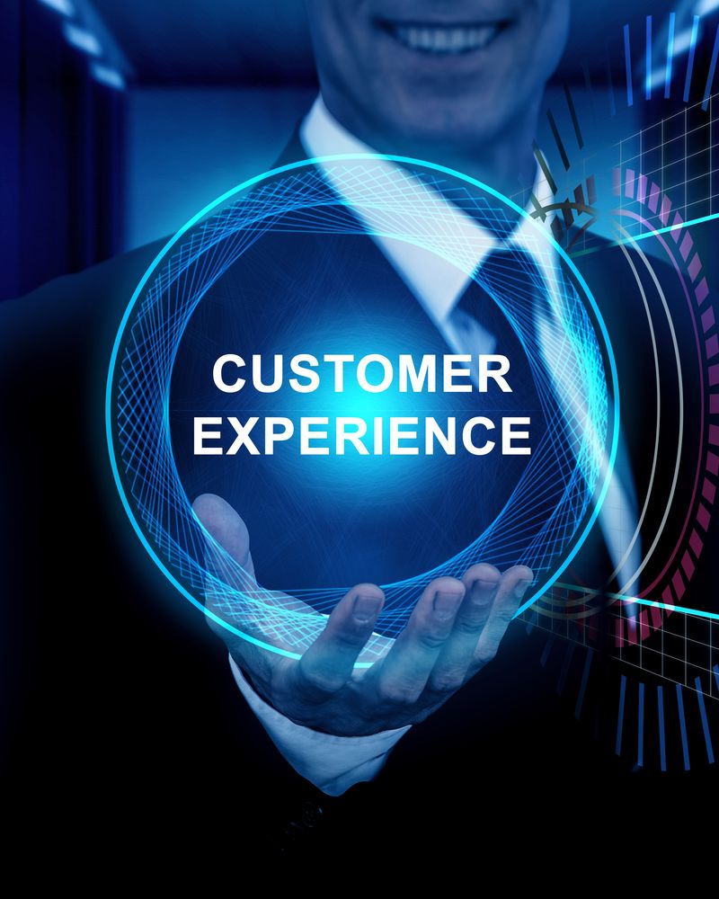 Business professional presenting a glowing customer experience concept